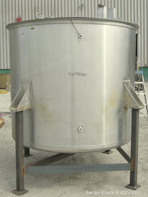 Used Tank, 1200 gallon, 316 stainless steel, vertical. 72" diameter x 62" straight side. Open top with (2) 1/3 covers, dished bottom. Provision for a clamp-on agitator. 3 1/2" center bottom outlet. M...