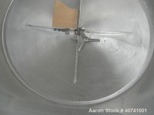 Used Tank, 1200 gallon, 316 stainless steel, vertical. 72" diameter x 62" straight side. Open top with (2) 1/3 covers, dished bottom. Provision for a clamp-on agitator. 3 1/2" center bottom outlet. M...