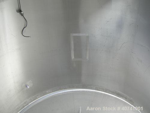 Used Tank, 1200 gallon, 316 stainless steel, vertical. 72" diameter x 62" straight side. Open top with (2) 1/3 covers, dished bottom. Provision for a clamp-on agitator. 3 1/2" center bottom outlet. M...
