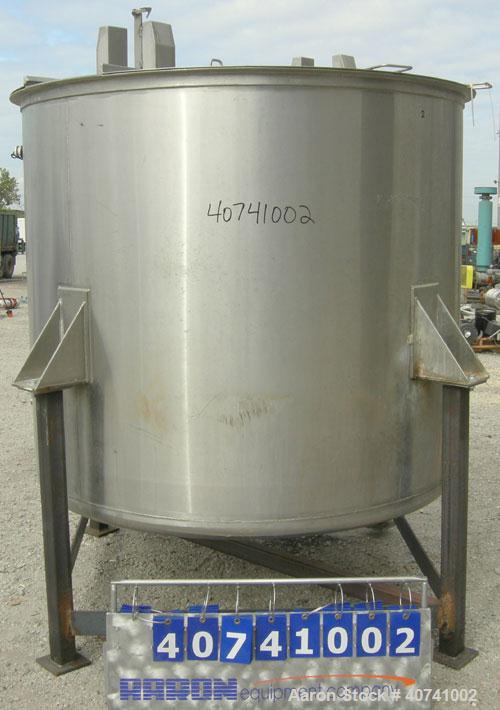 Used Tank, 1200 gallon, 316 stainless steel, vertical. 72" diameter x 62" straight side. Open top with (2) 1/3 covers, dished bottom. Provision for a clamp-on agitator. 3 1/2" center bottom outlet. M...