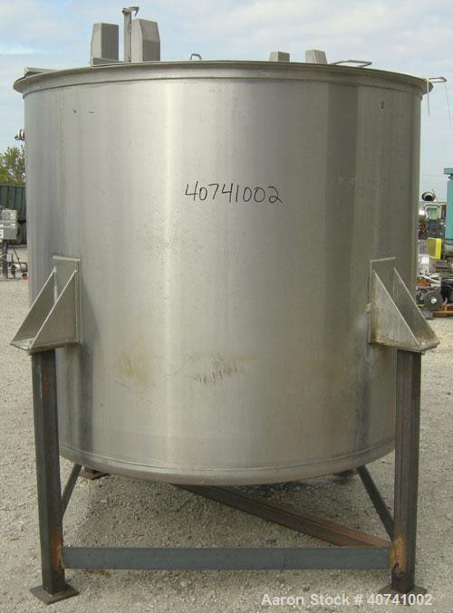 Used Tank, 1200 gallon, 316 stainless steel, vertical. 72" diameter x 62" straight side. Open top with (2) 1/3 covers, dished bottom. Provision for a clamp-on agitator. 3 1/2" center bottom outlet. M...