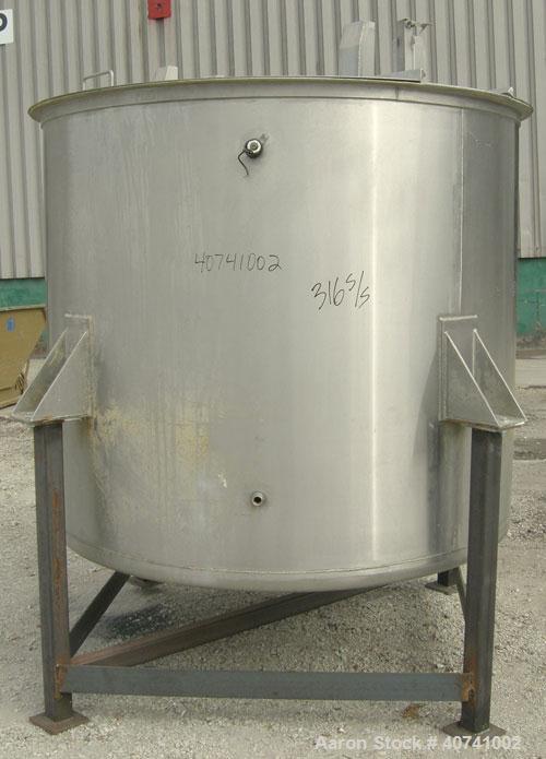 Used Tank, 1200 gallon, 316 stainless steel, vertical. 72" diameter x 62" straight side. Open top with (2) 1/3 covers, dished bottom. Provision for a clamp-on agitator. 3 1/2" center bottom outlet. M...