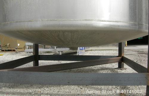 Used Tank, 1200 gallon, 316 stainless steel, vertical. 72" diameter x 62" straight side. Open top with (2) 1/3 covers, dished bottom. Provision for a clamp-on agitator. 3 1/2" center bottom outlet. M...
