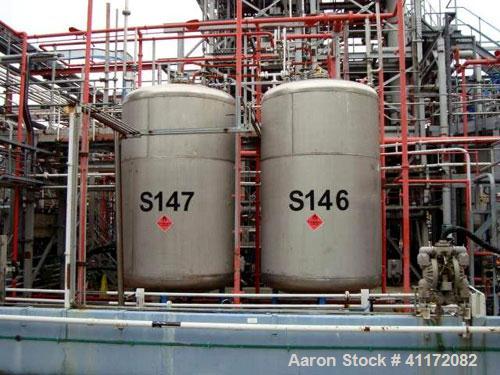 Used- Tank, Approximately 2457 Gallon (9,300 liter), Stainless Steel, Vertical.
