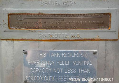 Used Bendel Tank, 3,000 Gallon, 304 Stainless Steel, Vertical. 94" diameter x 108" straight side, coned top, sloped bottom. UL rated for above ground flammable storage, UL#439353. Top mounted off cen...