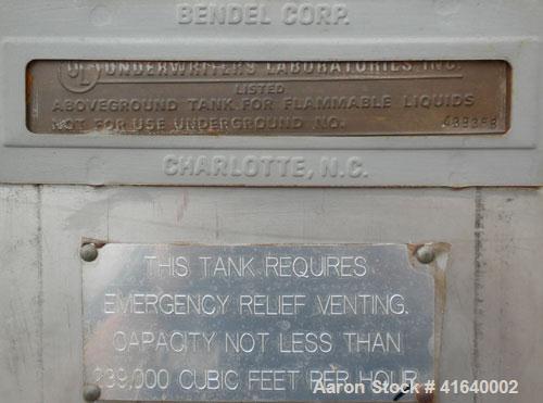 Used Bendel Tank, 3,000 Gallon, 304 Stainless Steel, Vertical. 94" diameter x 108" straight side, coned top, sloped bottom. UL rated for above ground flammable storage, UL#439358. Top mounted off cen...