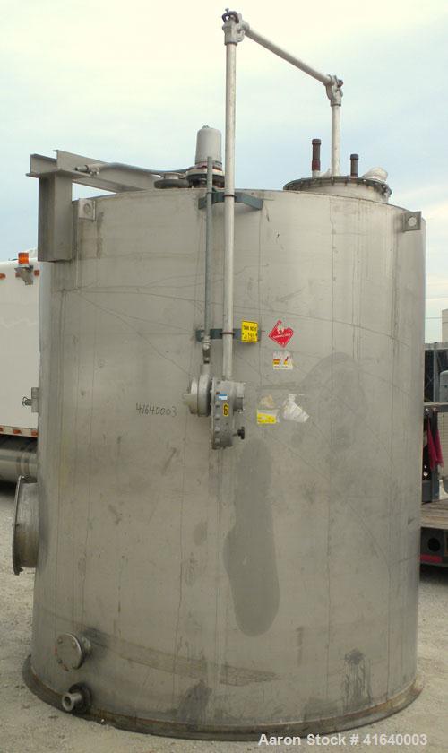 Used Bendel Tank, 3,000 Gallon, 304 Stainless Steel, Vertical. 94" diameter x 108" straight side, coned top, sloped bottom. UL rated for above ground flammable storage, UL#439357. Top mounted off cen...