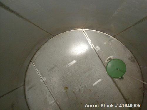Used Bendel Tank, 3,000 Gallon, 304 Stainless Steel, Vertical. 94" diameter x 108" straight side, coned top, sloped bottom. UL rated for above ground flammable storage, UL#439354. Top mounted off cen...