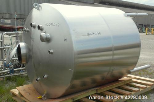 Used Tank, 1200 Gallon, 316 Stainless Steel, Vertical. 70" Diameter x 72" straight side, dished top and bottom. Openings: top (4) 2" tri-clamp, (2) 3" tri-clamp, 4" tri-clamp, 16" manway with cover; ...