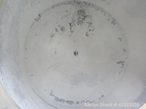 Used Tank, 1200 Gallon, 316 Stainless Steel, Vertical. 70" Diameter x 72" straight side, dished top and bottom. Openings: top (4) 2" tri-clamp, (2) 3" tri-clamp, 4" tri-clamp, 16" manway with cover; ...