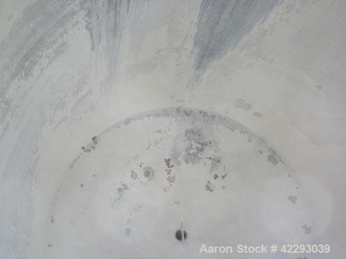 Used Tank, 1200 Gallon, 316 Stainless Steel, Vertical. 70" Diameter x 72" straight side, dished top and bottom. Openings: top (4) 2" tri-clamp, (2) 3" tri-clamp, 4" tri-clamp, 16" manway with cover; ...