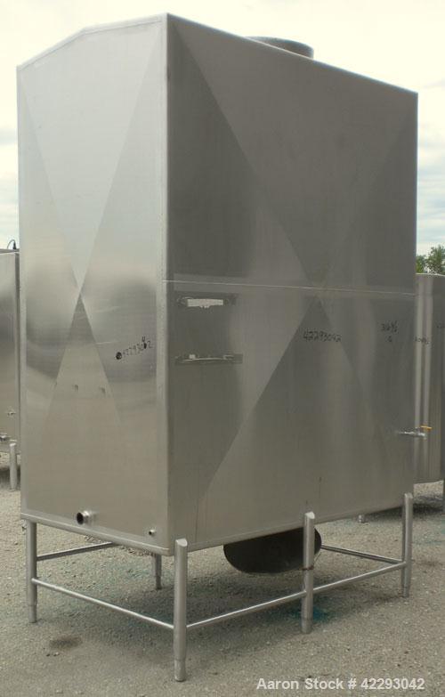 Used Rectangular Tank, 1500 Gallon, 316 Stainless Steel, Vertical. Approximately 76" long x 48" wide x 94" tall. Gabled top, flat bottom. Openings: top (2) 1-1/2" NPT, 3-1/2" threaded, (2) 2" tri-cla...