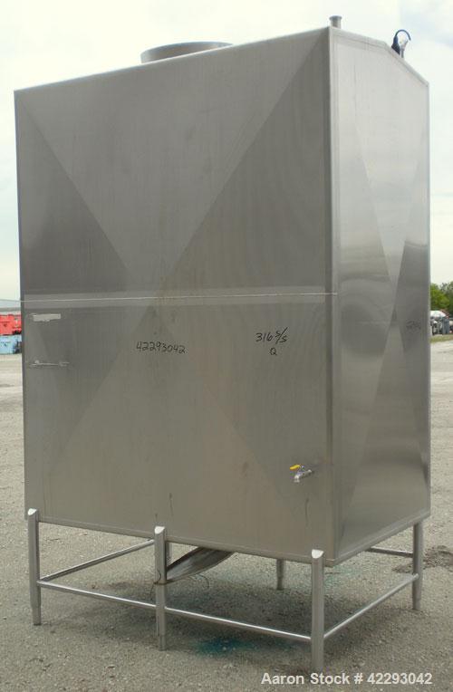 Used Rectangular Tank, 1500 Gallon, 316 Stainless Steel, Vertical. Approximately 76" long x 48" wide x 94" tall. Gabled top, flat bottom. Openings: top (2) 1-1/2" NPT, 3-1/2" threaded, (2) 2" tri-cla...