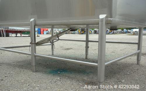 Used Rectangular Tank, 1500 Gallon, 316 Stainless Steel, Vertical. Approximately 76" long x 48" wide x 94" tall. Gabled top, flat bottom. Openings: top (2) 1-1/2" NPT, 3-1/2" threaded, (2) 2" tri-cla...