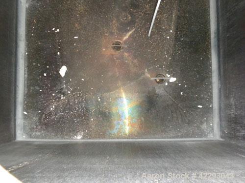 Used Square Tank, 1400 Gallon, 304 stainless steel, vertical. Approximately 66" long x 66" wide x 76" tall. Flat top and bottom. Openings: top 1" tri-clamp, 1-1/2" tri-clamp, 2" tri-clamp, (3) 3" tri...