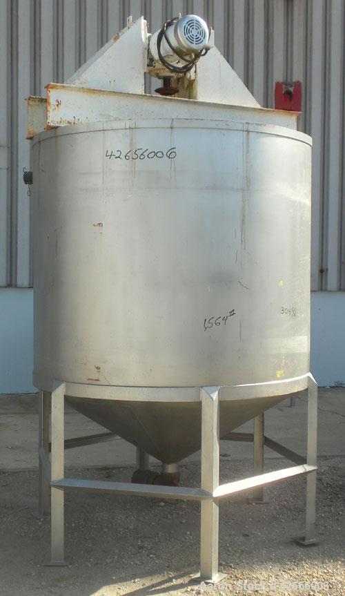 Used Tank, 1100 Gallon, 304 Stainless Steel, Vertical. 72" Diameter x 62" straight side x 42" coned bottom, open top with no covers. Carbon steel agitator bridge, approximate 2" diameter carbon steel...