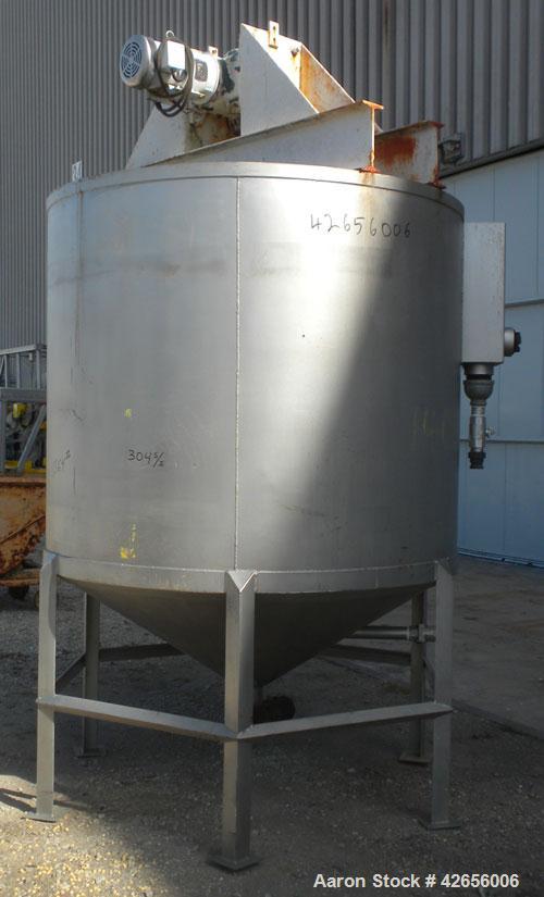 Used Tank, 1100 Gallon, 304 Stainless Steel, Vertical. 72" Diameter x 62" straight side x 42" coned bottom, open top with no covers. Carbon steel agitator bridge, approximate 2" diameter carbon steel...