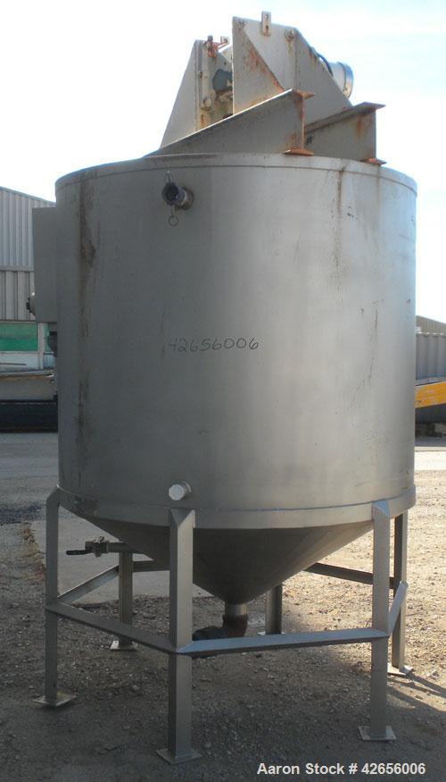 Used Tank, 1100 Gallon, 304 Stainless Steel, Vertical. 72" Diameter x 62" straight side x 42" coned bottom, open top with no covers. Carbon steel agitator bridge, approximate 2" diameter carbon steel...