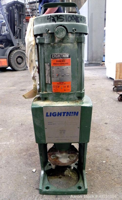Used Tank, 2000 Gallon, Stainless Steel, Vertical. 84" Diameter x 80" straight side. Dished top, coned bottom. Off center top entering Lightnin agitator, model XJC-117. 1-1/2" Diameter shaft with (2)...