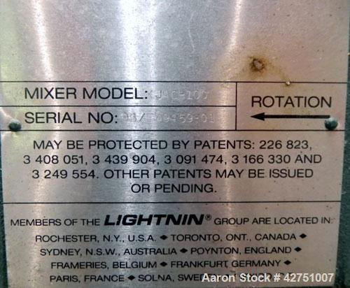 Used Tank, 2000 Gallon, 304 Stainless Steel, Vertical. 84" Diameter x 80" straight side. Dished top, coned bottom. Off center top entering Lightnin air operated agitator, model XJAC-100. 1-1/2" Diame...