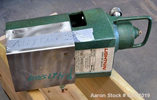 Used Tank, 2000 Gallon, 304 Stainless Steel, Vertical. 84" Diameter x 80" straight side. Dished top, coned bottom. Off center top entering Lightnin air operated agitator, model XJAC-100. 1-1/2" Diame...