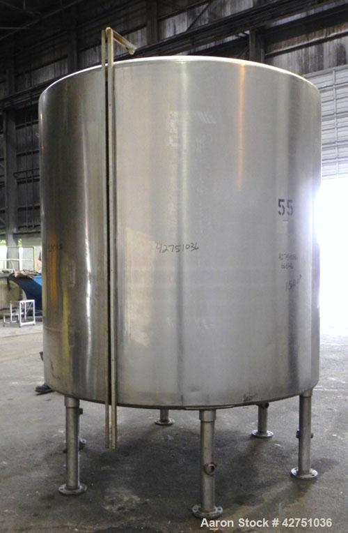 Used Tank, 2000 Gallon, 304 Stainless Steel Vertical. 84" Diameter x 80" straight side. Dished top, coned bottom. Openings top 2", 6", 18" man way with cover, side 2". 3" Tri-clamp center bottom outl...