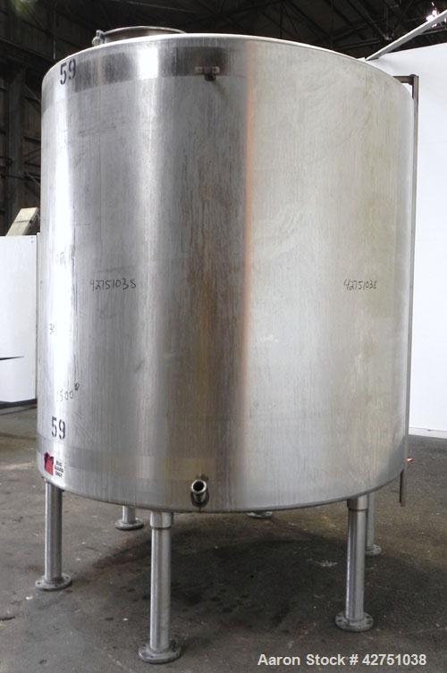 Used Tank, 2000 Gallon, 304 Stainless Steel Vertical. 84" Diameter x 80" straight side. Dished top, coned bottom. Openings top 2", 6", 18" man way with cover, side 2". 3" Tri-clamp center bottom outl...