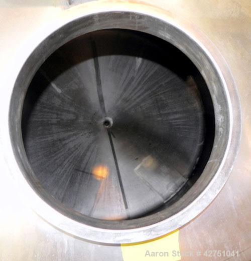 Used Tank, 2000 Gallon, 304 Stainless Steel Vertical. 84" Diameter x 80" straight side. Dished top, coned bottom. Openings top 2", 4", 18" man way with cover, side 2". 2" Tri-clamp center bottom outl...