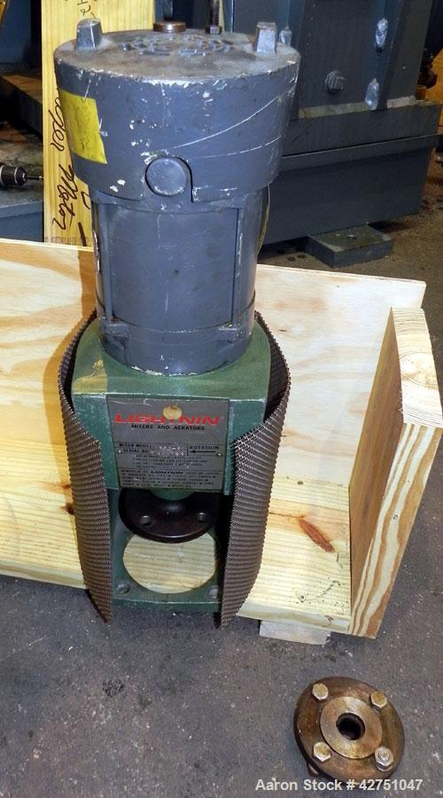 Used Tank, 2000 Gallon, 304 Stainless Steel, Vertical. 84" Diameter x 78" straight side, dished top, coned bottom. Openings top (3) 1-1/2", (5) 2" NPT, 3", 6", 15" man way with cover. 3" Threaded cen...