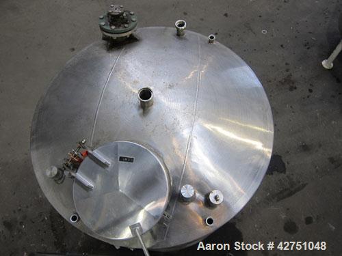 Used- Tank, 1000 Gallon, 304 Stainless Steel, Vertical. 66" Diameter x 64" straight side, dished top, coned bottom. Off cent...
