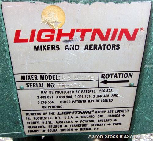 Used Tank, 1000 Gallon, 304 Stainless Steel, Vertical. 66" Diameter x 64" straight side, dished top, coned bottom. Off center top entering Lightnin agitator model N33G-75. 1-1/2" Diameter shaft with ...
