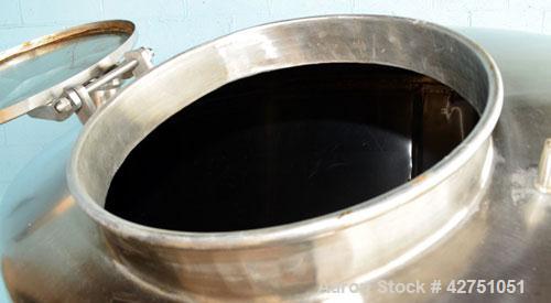 Used Tank, 1000 Gallon, Stainless Steel, Vertical. 66" Diameter x 66" straight side, dished top, coned bottom. Openings top 1-1/2", (2) 2" NPT, (2) 3", 18" man way with cover. 2" Tri-clamp center bot...