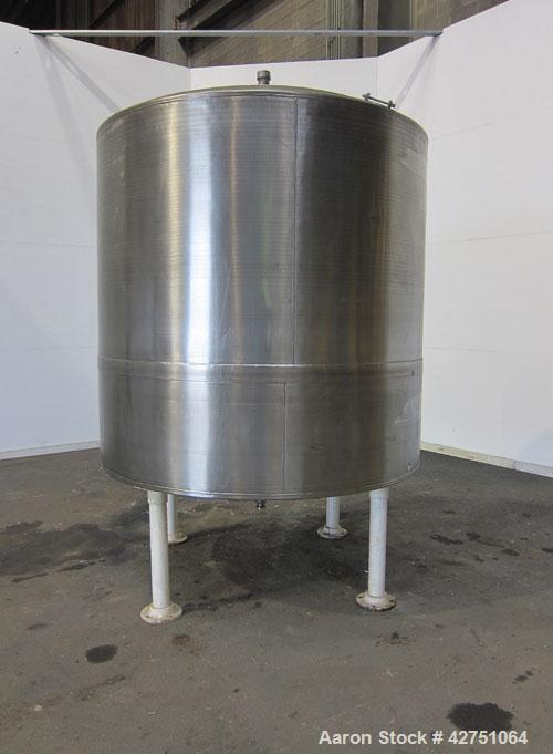 Previous owned - Tank, 1500 Gallon, 304 Stainless Steel, Vertical. 75-1/2" Diameter x 72" straight side, dished top, coned b...