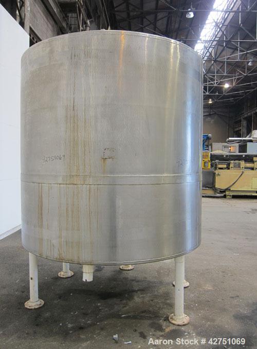 Used Tank, 2000 Gallon, 304 Stainless Steel, Vertical. 84" Diameter x 84" straight side. Dished top, coned bottom. Openings top 1-1/2" tri-clamp, 3", (2) 2" NPT, 6", 18" man way with cover. 2" Thread...