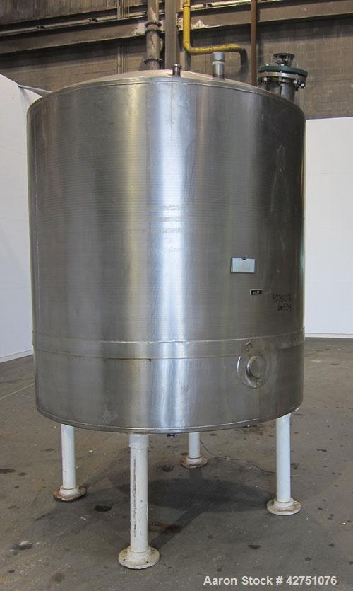 Used Tank, 1000 Gallon, 304 Stainless Steel, Vertical. 66" Diameter x 66" straight side, dished top, coned bottom. Off center top entering Lightnin agitator, Model N33G-75, 1-1/2" diameter shaft with...