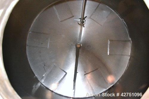 Used Tank, 2000 Gallon, 304 Stainless Steel Vertical. 84” Diameter x 80” straight side. Dished top, coned bottom. Off center top entering Lightnin air operated agitator, model N33AG-100. 1-1/2” Diame...
