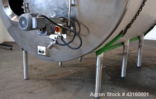 Used Storage Tank, 3000 Gallon, 304 Stainless Steel, Horizontal. 90" Diameter x 96" straight side, dished heads. Insulated with carbon steel sheathing. Partial jacket, no rating. (1) Spray ball. Side...