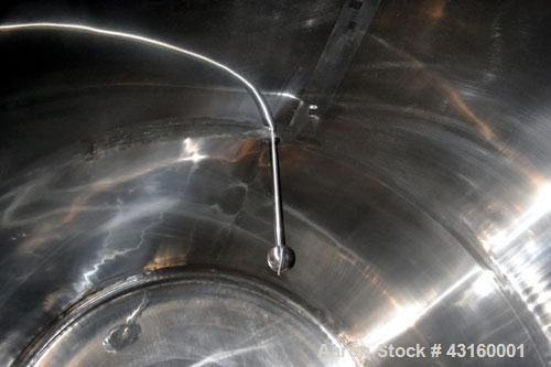 Used Storage Tank, 3000 Gallon, 304 Stainless Steel, Horizontal. 90" Diameter x 96" straight side, dished heads. Insulated with carbon steel sheathing. Partial jacket, no rating. (1) Spray ball. Side...