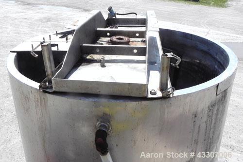 Used Kettle, 3000 Gallon, 304 Stainless Steel, Vertical. Approximate 90" diameter x 116" straight side, open top, no covers, sloped bottom. Dimple jacketed, no rating. Bolt on stainless steel agitato...
