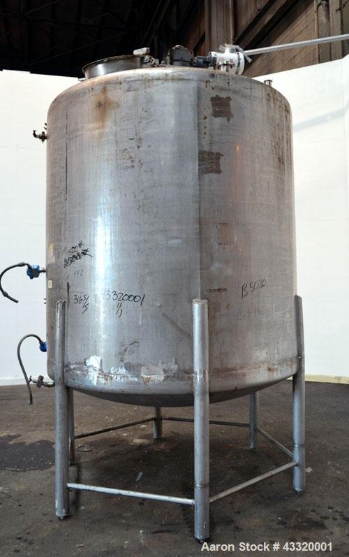 Used Tank, 1500 Gallon, 316 Stainless Steel, Vertical. Approximate 76” diameter x 72” straight side, dished top and bottom. Fixed stainless steel agitator mount with a UET agitator, model XCEL-6, out...