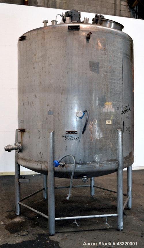 Used Tank, 1500 Gallon, 316 Stainless Steel, Vertical. Approximate 76” diameter x 72” straight side, dished top and bottom. Fixed stainless steel agitator mount with a UET agitator, model XCEL-6, out...