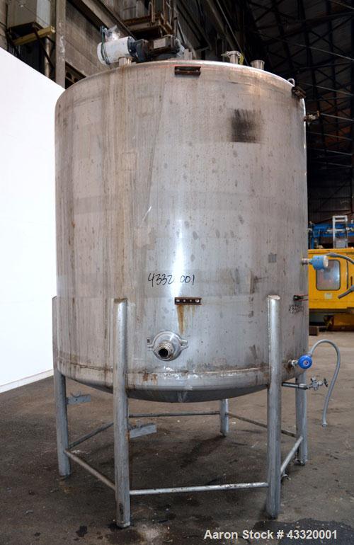 Used Tank, 1500 Gallon, 316 Stainless Steel, Vertical. Approximate 76” diameter x 72” straight side, dished top and bottom. Fixed stainless steel agitator mount with a UET agitator, model XCEL-6, out...
