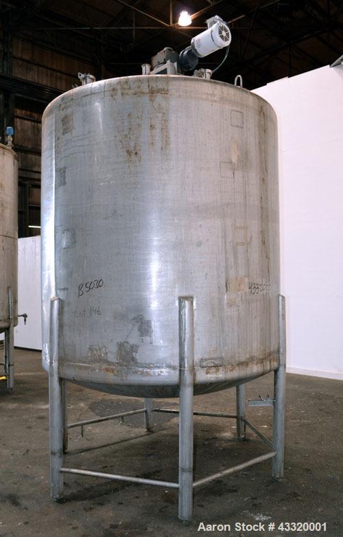 Used Tank, 1500 Gallon, 316 Stainless Steel, Vertical. Approximate 76” diameter x 72” straight side, dished top and bottom. Fixed stainless steel agitator mount with a UET agitator, model XCEL-6, out...