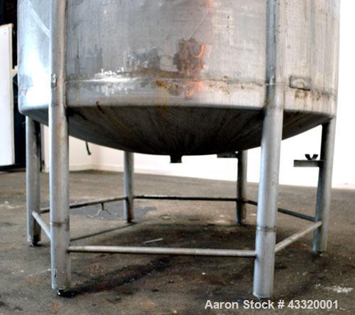 Used Tank, 1500 Gallon, 316 Stainless Steel, Vertical. Approximate 76” diameter x 72” straight side, dished top and bottom. Fixed stainless steel agitator mount with a UET agitator, model XCEL-6, out...