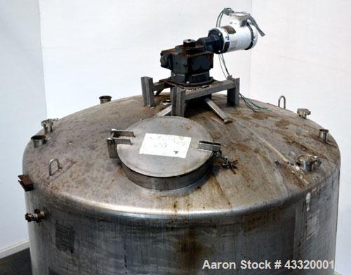Used Tank, 1500 Gallon, 316 Stainless Steel, Vertical. Approximate 76” diameter x 72” straight side, dished top and bottom. Fixed stainless steel agitator mount with a UET agitator, model XCEL-6, out...