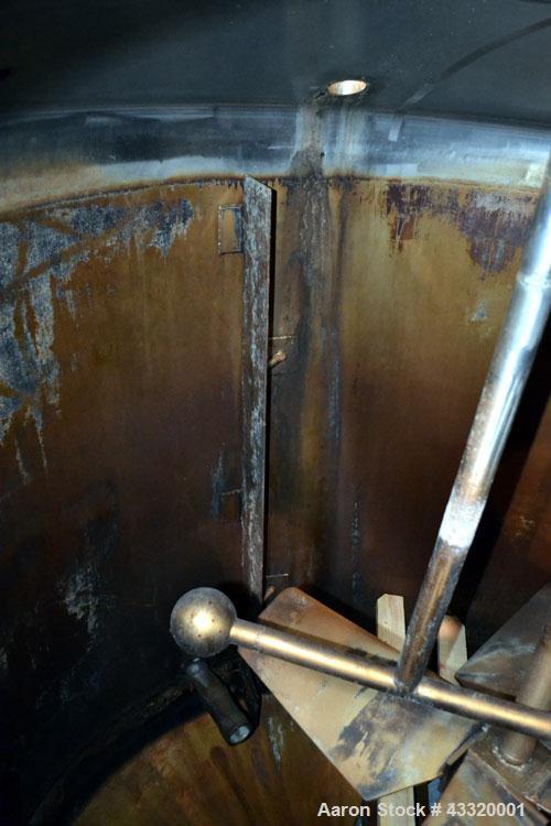 Used Tank, 1500 Gallon, 316 Stainless Steel, Vertical. Approximate 76” diameter x 72” straight side, dished top and bottom. Fixed stainless steel agitator mount with a UET agitator, model XCEL-6, out...