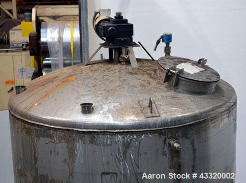 Used Tank, 1900 Gallon, 316 Stainless Steel, Vertical. Approximate 76” diameter x 92” straight side, dished top and bottom. Fixed stainless steel agitator mount with a UET agitator, model XCEL-6, out...