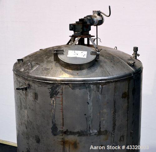 Used Tank, 1900 Gallon, 316 Stainless Steel, Vertical. Approximate 76” diameter x 92” straight side, dished top and bottom. Fixed stainless steel agitator mount with a UET agitator, model XCEL-6, out...