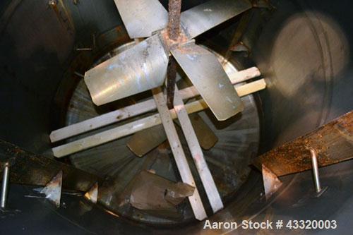 Used Tank, 1900 Gallon, 316 Stainless Steel, Vertical. Approximate 76” diameter x 92” straight side, dished top and bottom. Fixed stainless steel agitator mount with a UET agitator, model XCEL-6, out...