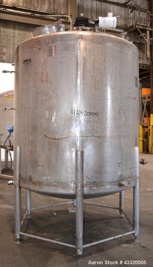 Used Tank, 1500 Gallon, 316 Stainless Steel, Vertical. Approximate 76” diameter x 72” straight side, dished top and bottom. Fixed stainless steel agitator mount with a UET agitator, model XCEL-6, out...